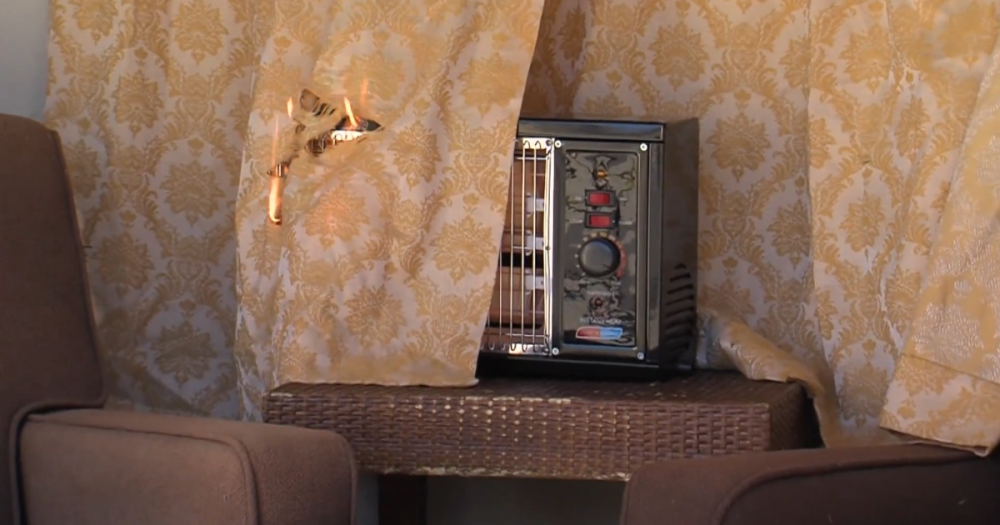 curtain covering a space heater which results in catching on fire.