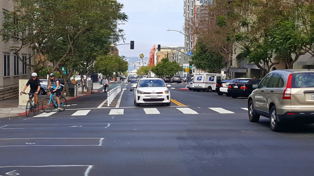street with cars and bikers