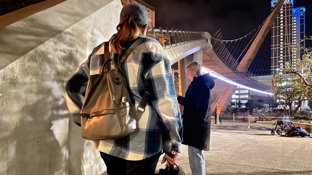 Two individuals in downtown
