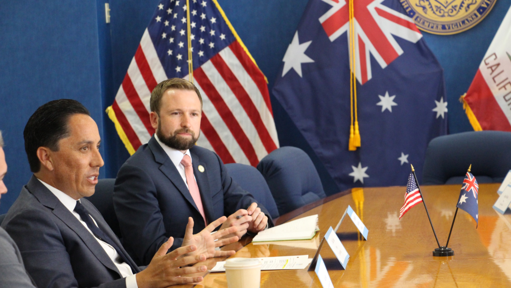 Picture of the Mayor speaking while sitting at a table