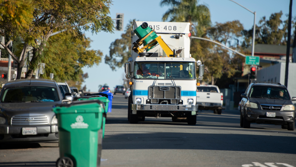Picture of trash truck on a street