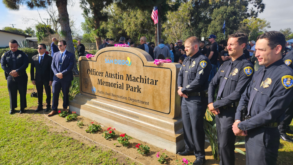 Officer Machitar signage at the entrance of the park