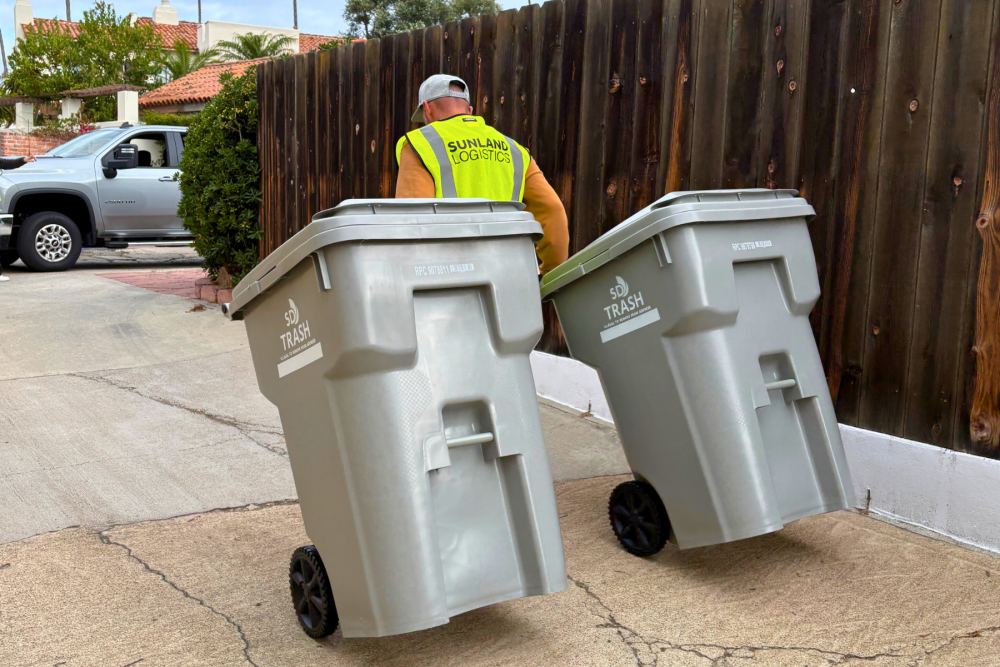 New gray trash bins being delivered