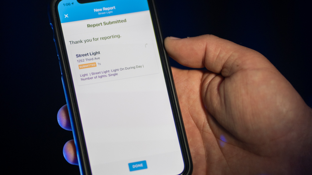 Photo of get it done report on cell phone