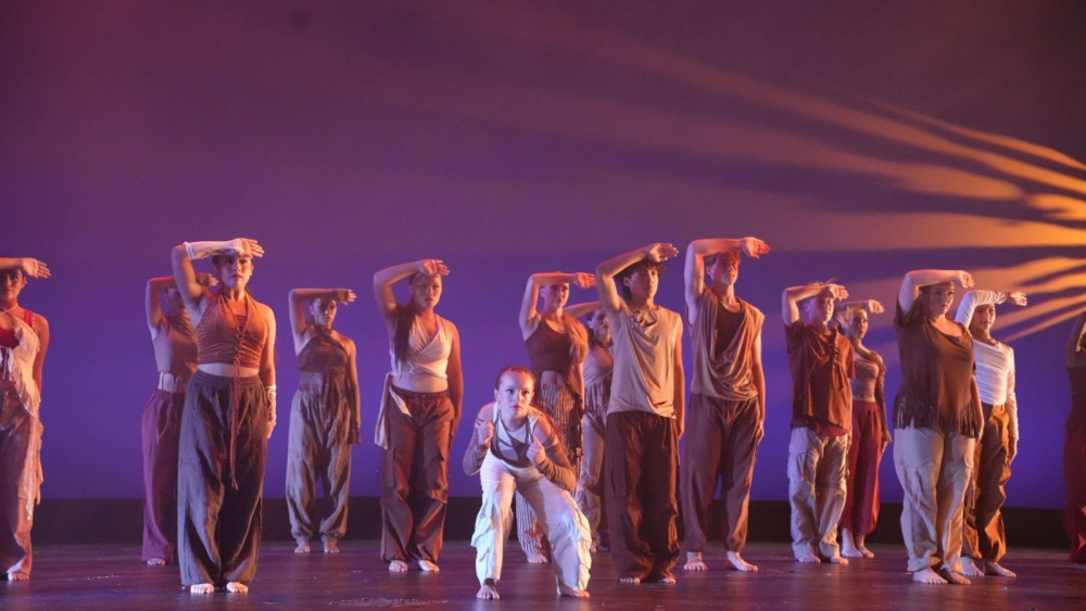 kids on stage performing