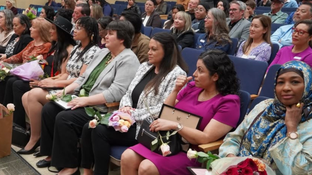 Photo of women sitting down
