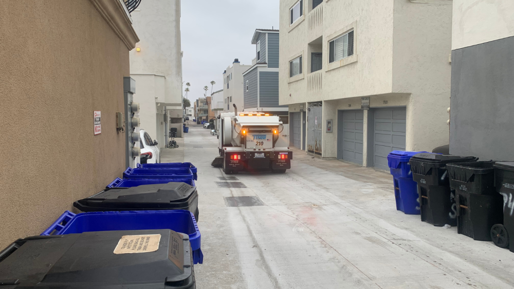 Street sweeper cleaning street