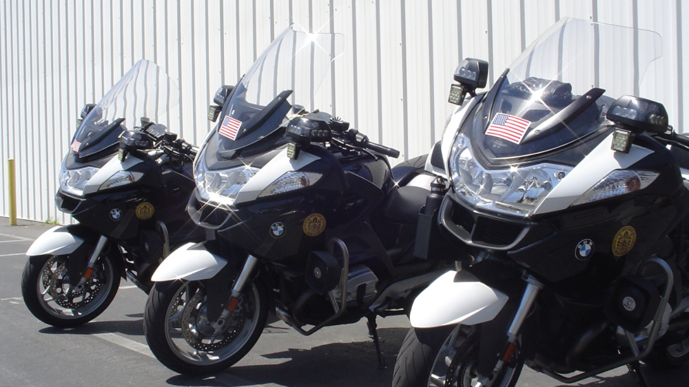 Three police motorcycles