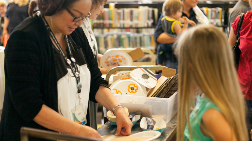 Library staff and children
