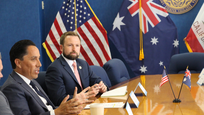 Picture of the Mayor speaking while sitting at a table