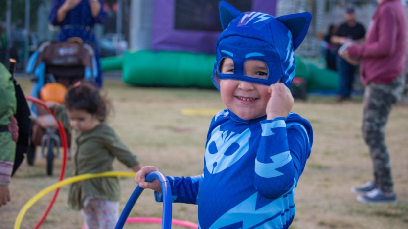 Child dressed for Halloween in blue