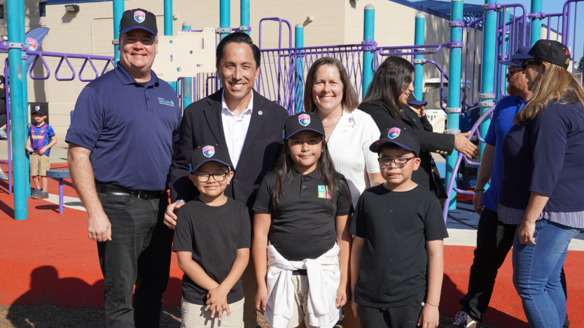 Photo of Mayor and Parks and Rec Director with three children
