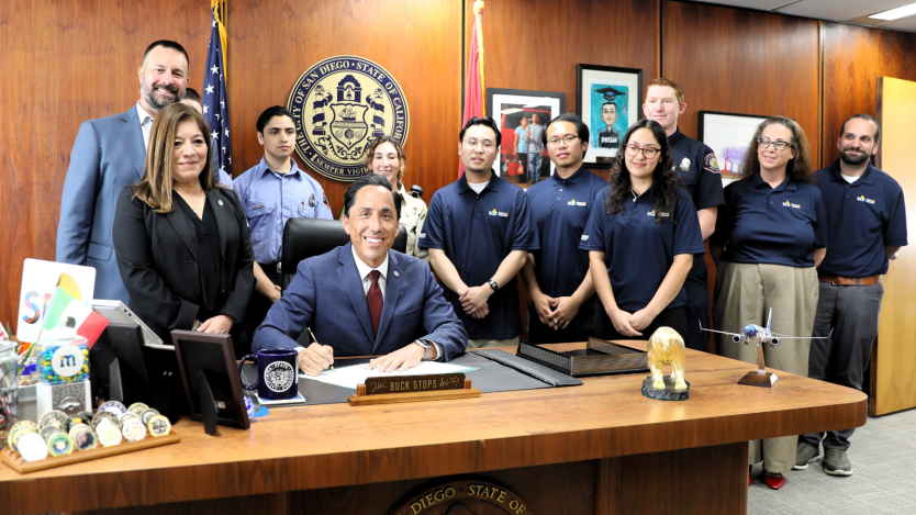 Photo of Mayor after he signed resolution