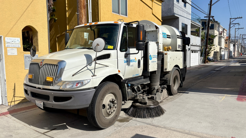 Up close of City sweeping truck